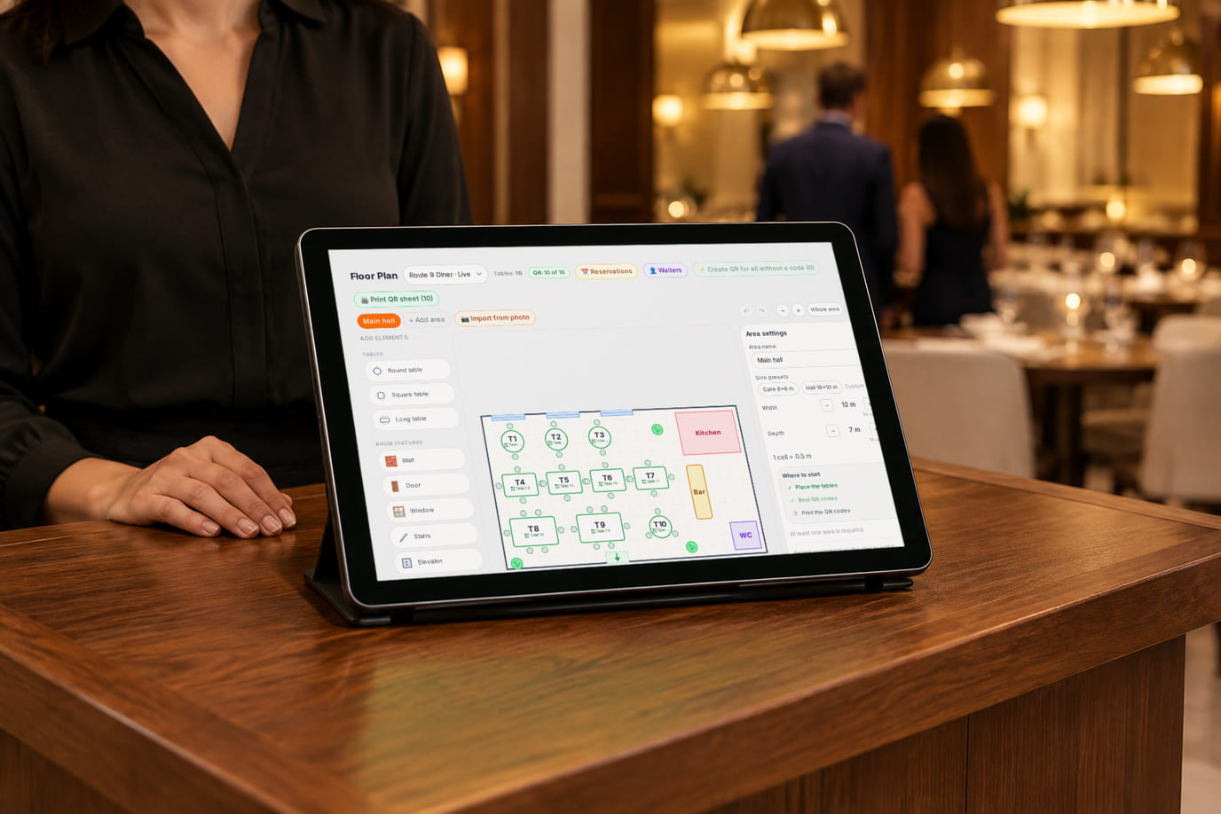 Host stand at the restaurant entrance with a tablet showing the floor plan and tables